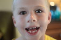dsc_8424.jpg Devin loses his first tooth!