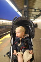 dsc_9599.jpg When's the train coming?  Devin waiting to head back to Manhattan after visiting Queens, his 5th Borough.